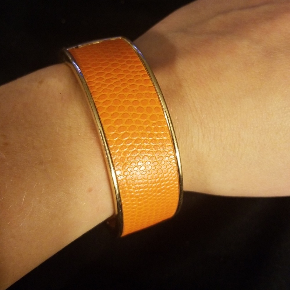 Orange leather and gold bangle